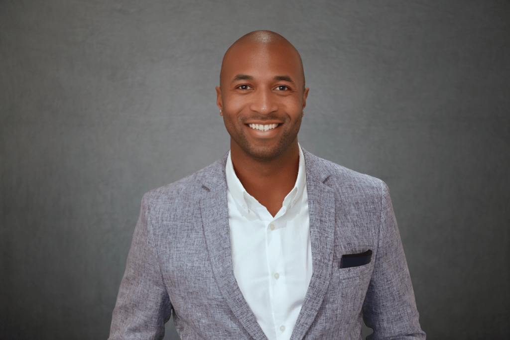 Young black man dressed professionally in a suit