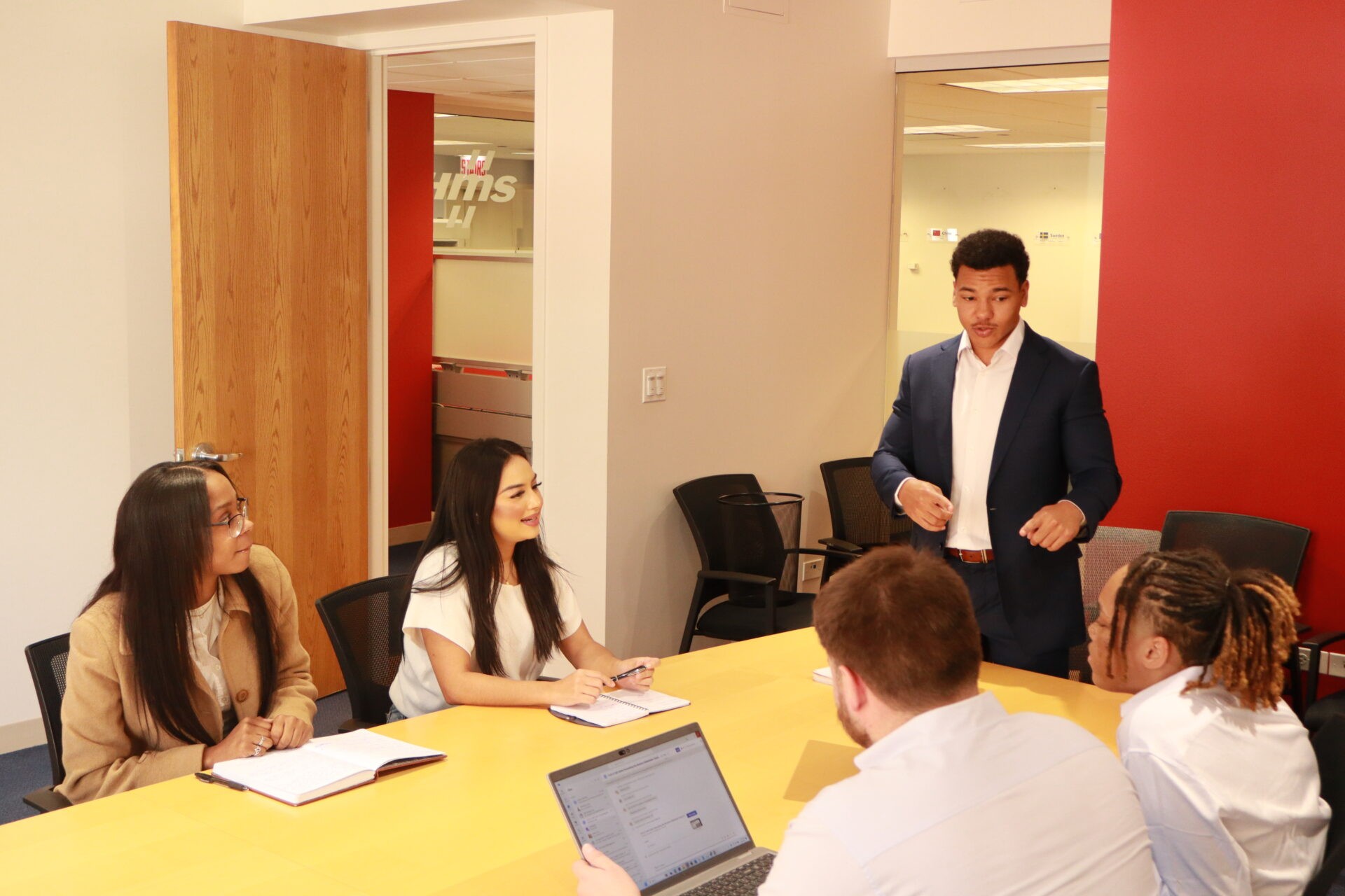 Group of diverse professionals having a meeting in a conference room