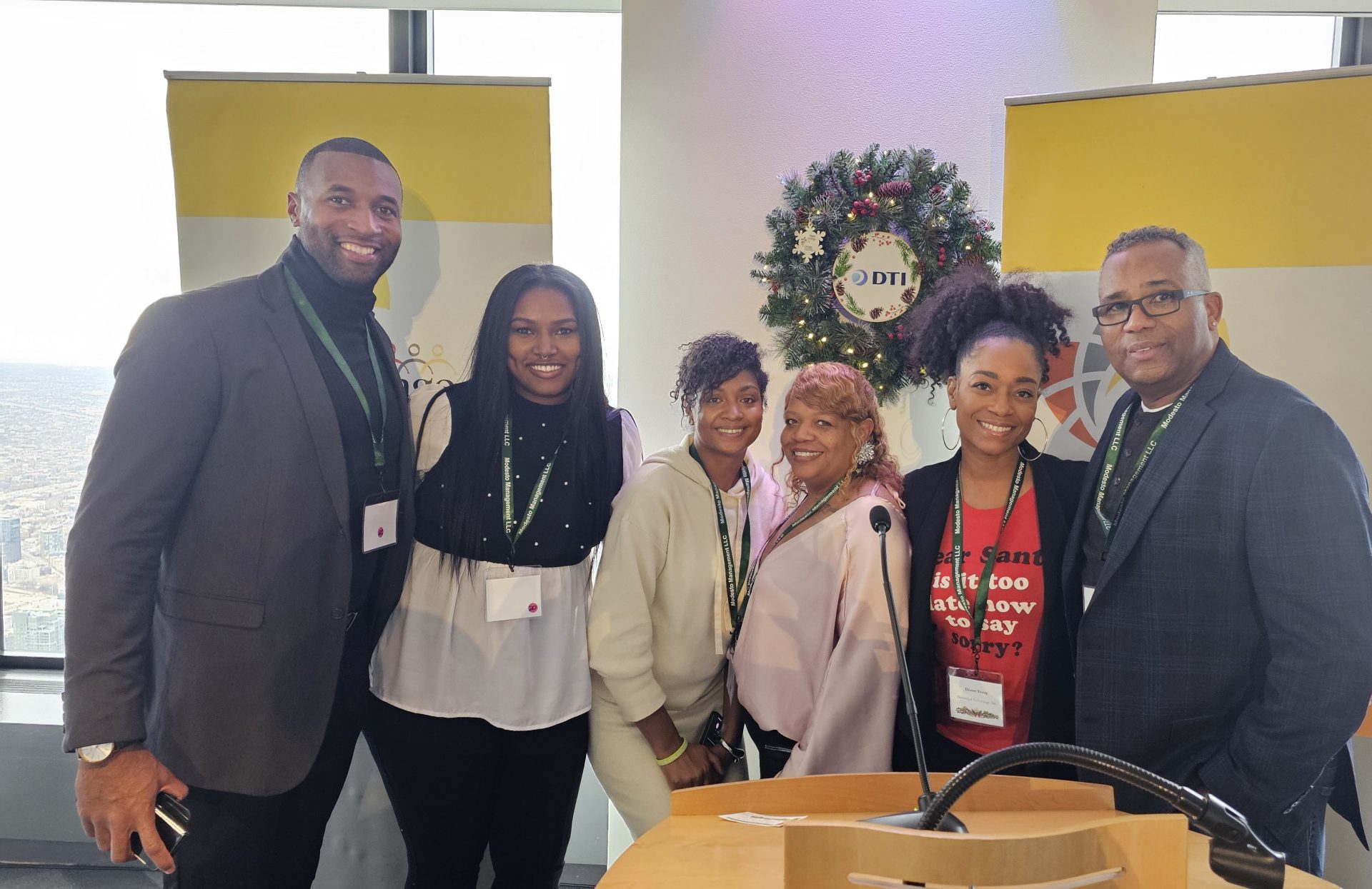 A group of black professionals at an event