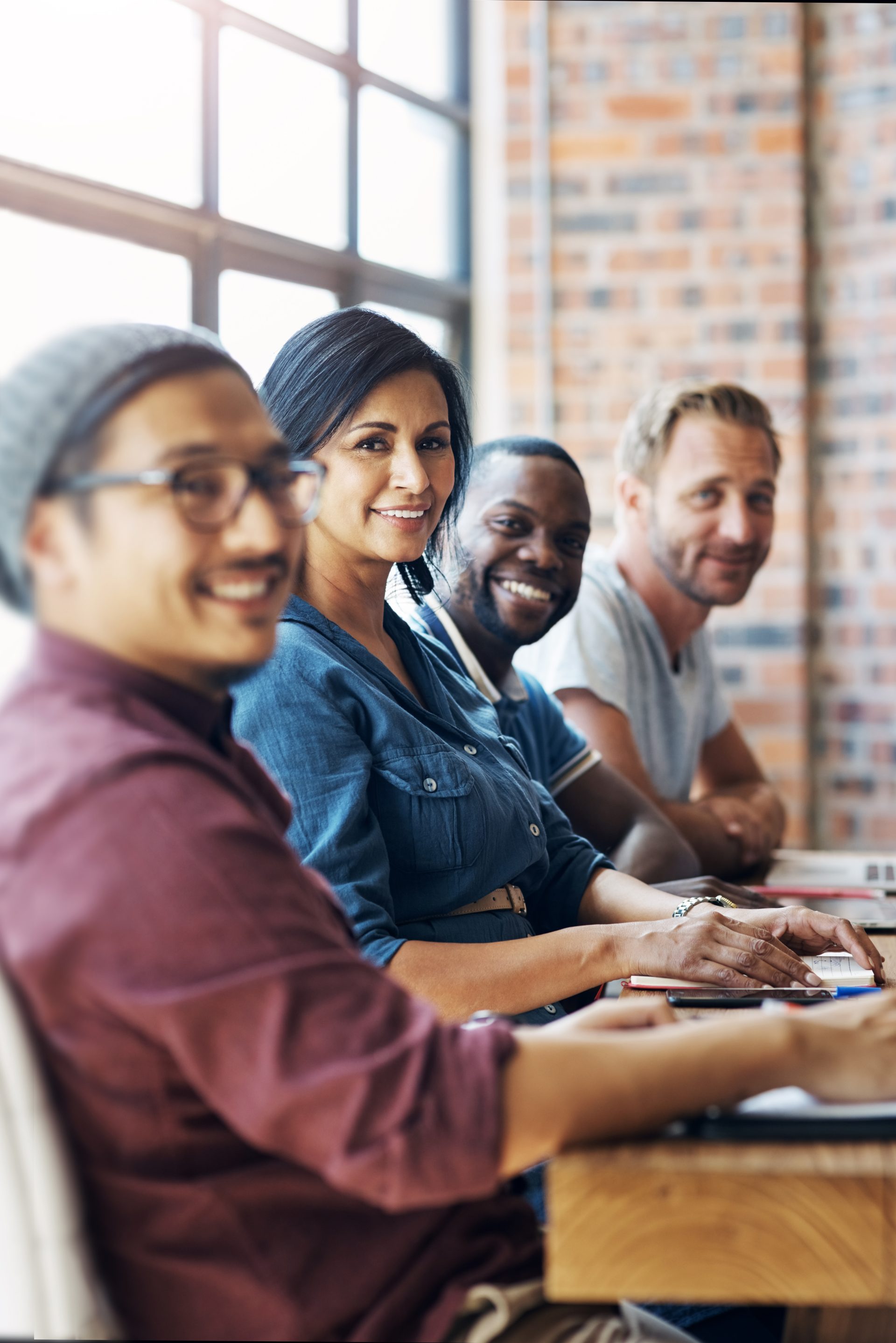 Portrait of a group of businesspeople sitting in an office